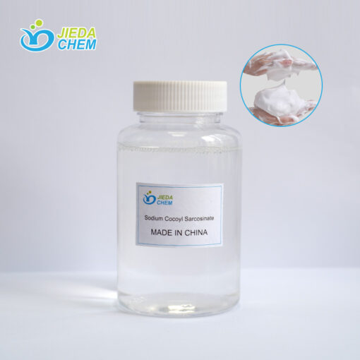 The transparent liquid Sodium lauroyl sarcosinate in the small bottle is poured into the beaker